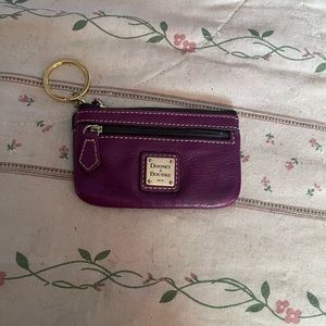 Dooney and Bourke change purse with keychain holder.